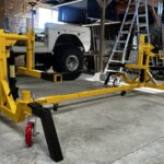 Experience the best gear-driven automotive car rotisserie, rated for 4,500 lbs., delivering unmatched ease, safety, and efficiency in your workshop.